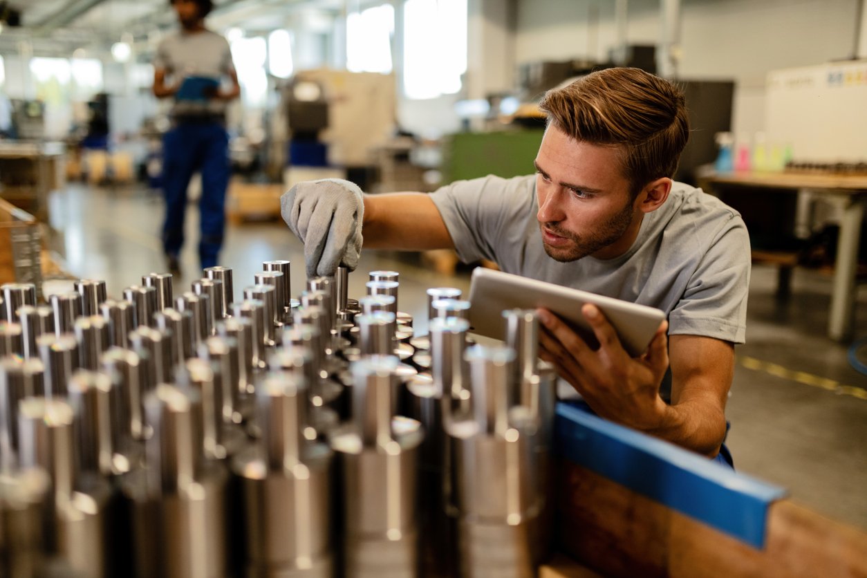 Mobile inspection app running a quality checklist on a factory floor