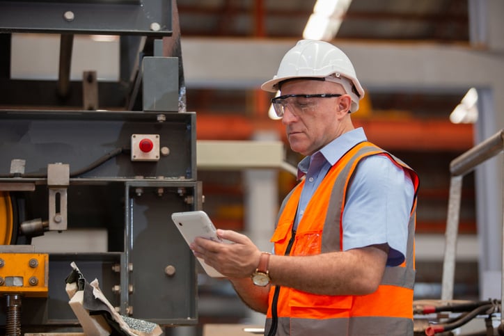 Manager reviews data to supplement ERP managed operations